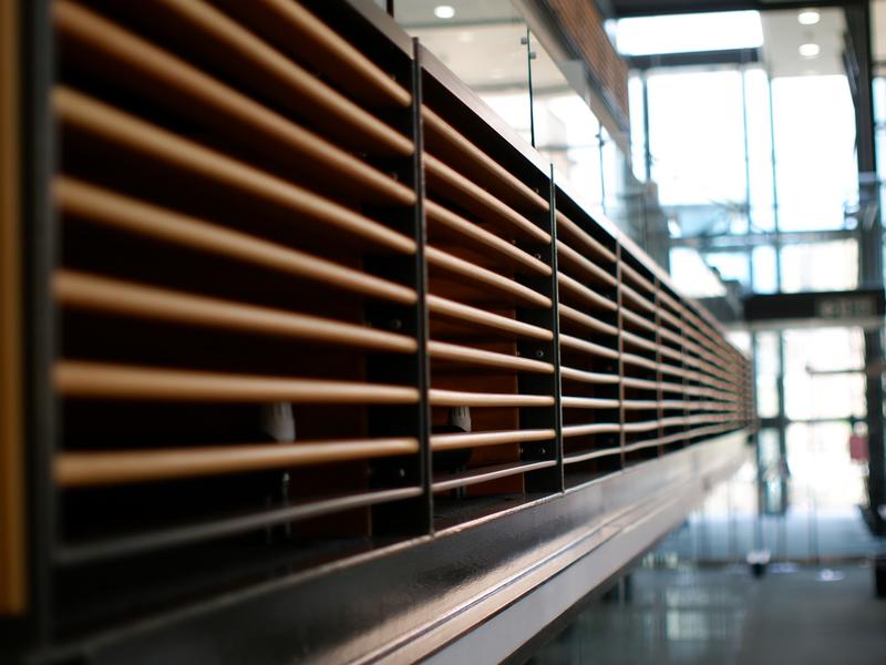 wooden frontage of the balcony over looking the library