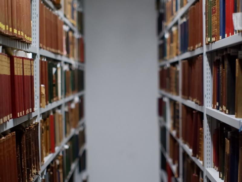 an isle of books in the library