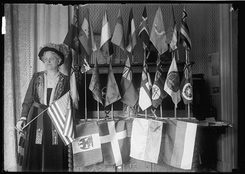 Carrie Chapman Catt with flags of 22 nations