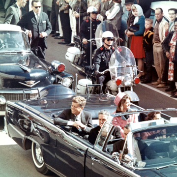 President Kennedy in the limousine in Dallas, Texas, minutes before his assassination.